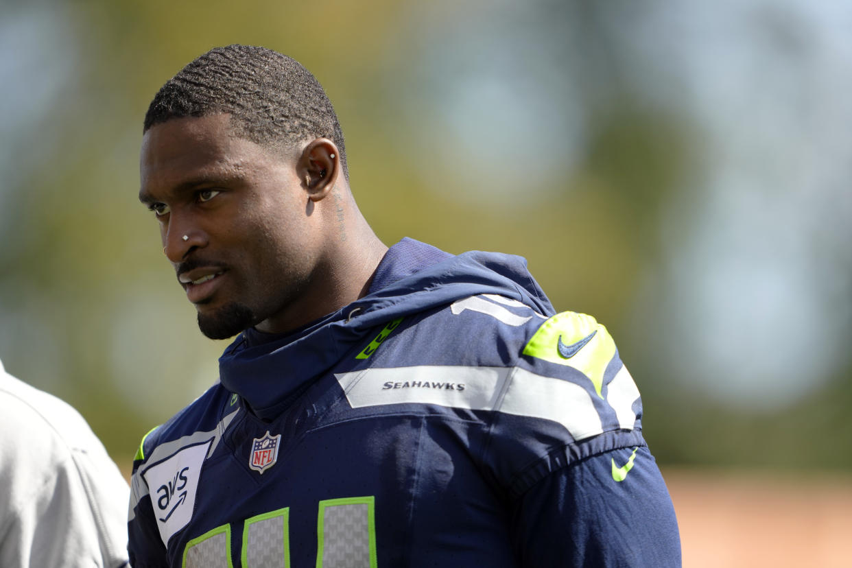 Seattle Seahawks wide receiver DK Metcalf walks off the field after the NFL football team's practice Tuesday, June 11, 2024, in Renton, Wash. (AP Photo/Lindsey Wasson)