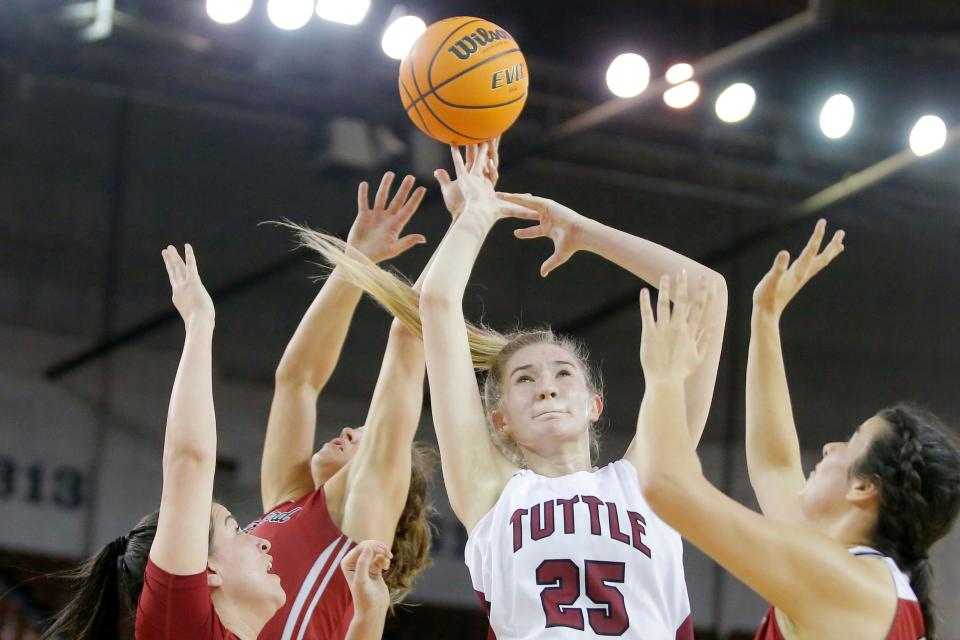 Tuttle's Landry Allen, center, helped the Tigers reach the Class 4A semifinals this year.