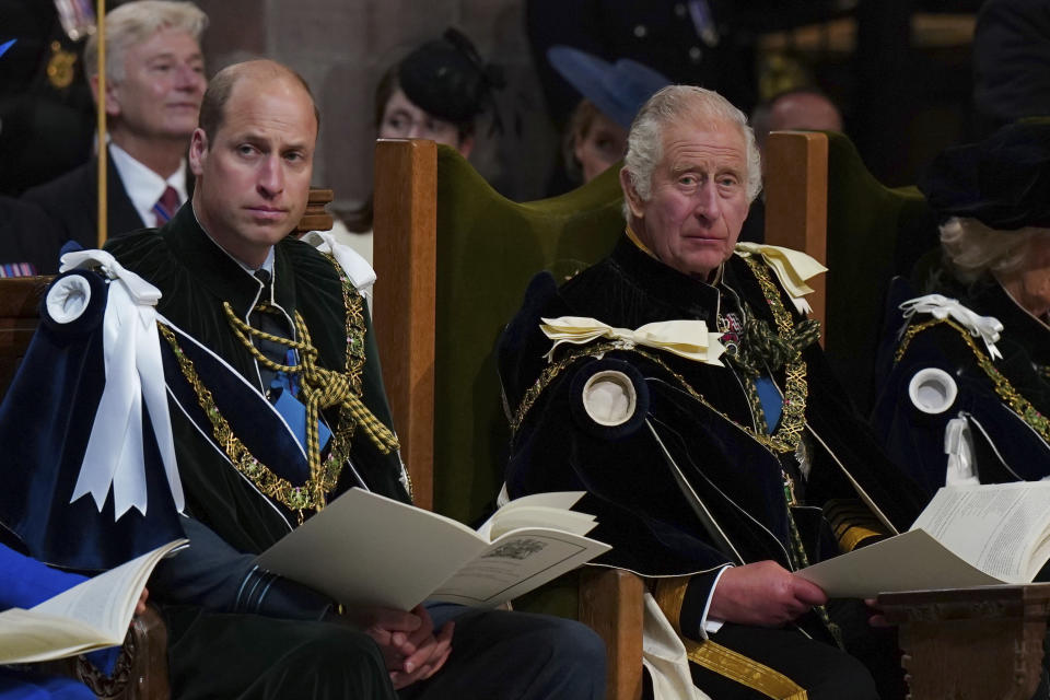 FILE - Britain's Prince William, known as the Duke of Rothesay while in Scotland, and King Charles III during the National Service of Thanksgiving and Dedication for King Charles III and Queen Camilla, and the presentation of the Honours of Scotland, at St Giles' Cathedral, in Edinburgh, Wednesday, July 5, 2023. At an age when many of his contemporaries have long since retired, King Charles III is not one to put his feet up. The king will mark his 75th birthday on Tuesday, Nov. 14, 2023, by highlighting causes close to his heart. (Jane Barlow/Pool photo via AP, File)