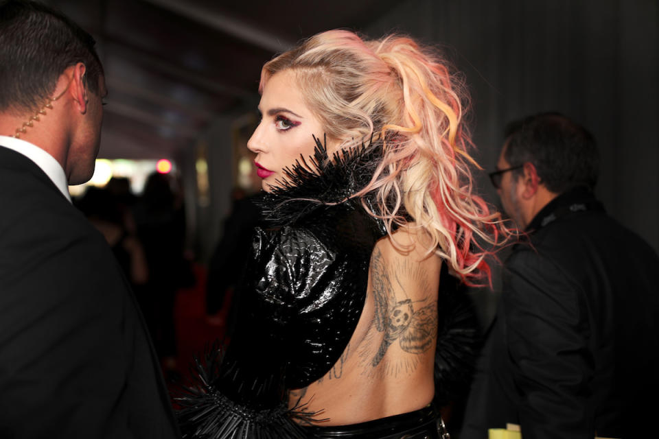 <p>Musician Lady Gaga debuted a moth tattoo on her back that was inspired by her performance of the song “Moth Into Flame” with Metallica. (Photo: Getty Images) </p>