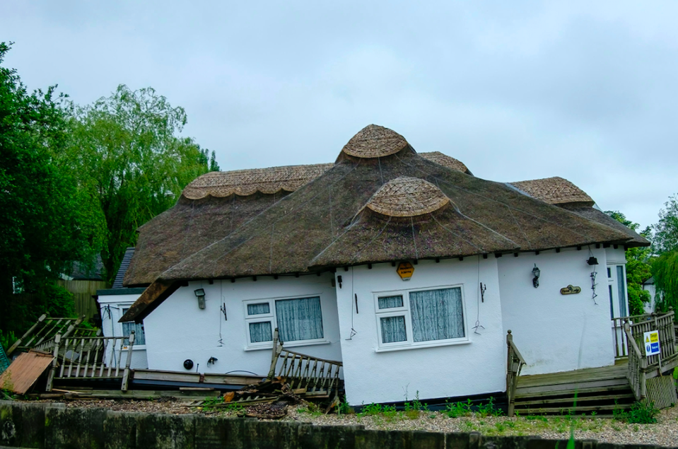 A couple discovered their cottage on the Norfolk Broads sinking (SWNS)