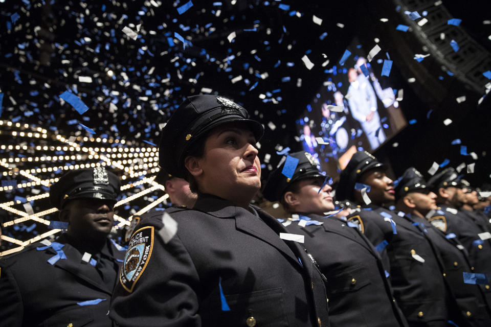 Confetti falls on newest NYPD officers