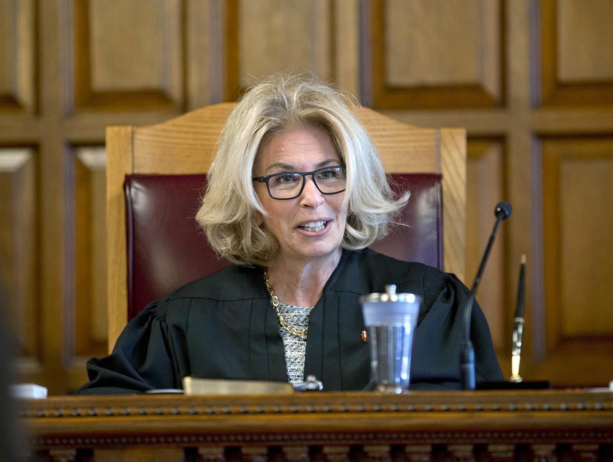 Chief Judge Janet DiFiore speaks during a swearing-in ceremony for Associate Judge Michael Garcia at the Court of Appeals on Monday, April 25, 2016, in Albany, N.Y. 