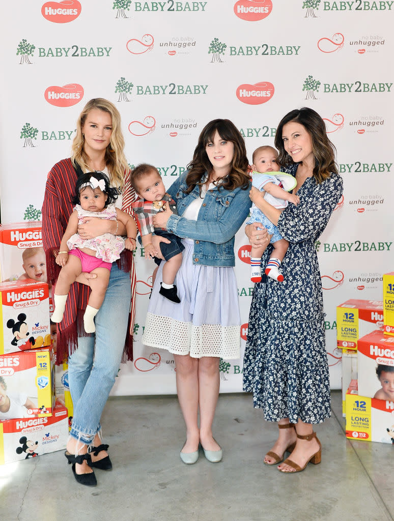 Zooey Deschanel with Baby2Baby's Kelly Sawyer and Norah Weinstein at the event. Again, not her baby.