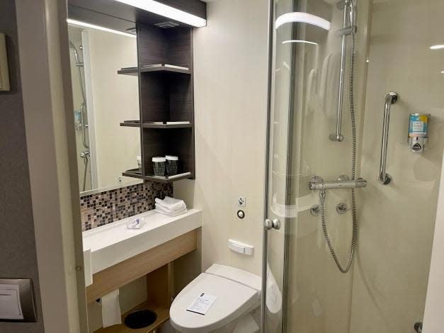 bathroom of interior carbin on symphony of the seas, view of sink, toilet, shower