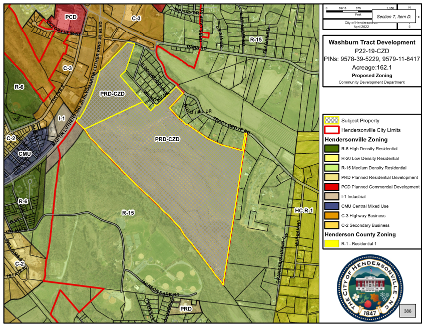 A map showing the approved development area for the Washburn Tract Development, outlined in yellow with grey hatching, and the surrounding zones and roads.