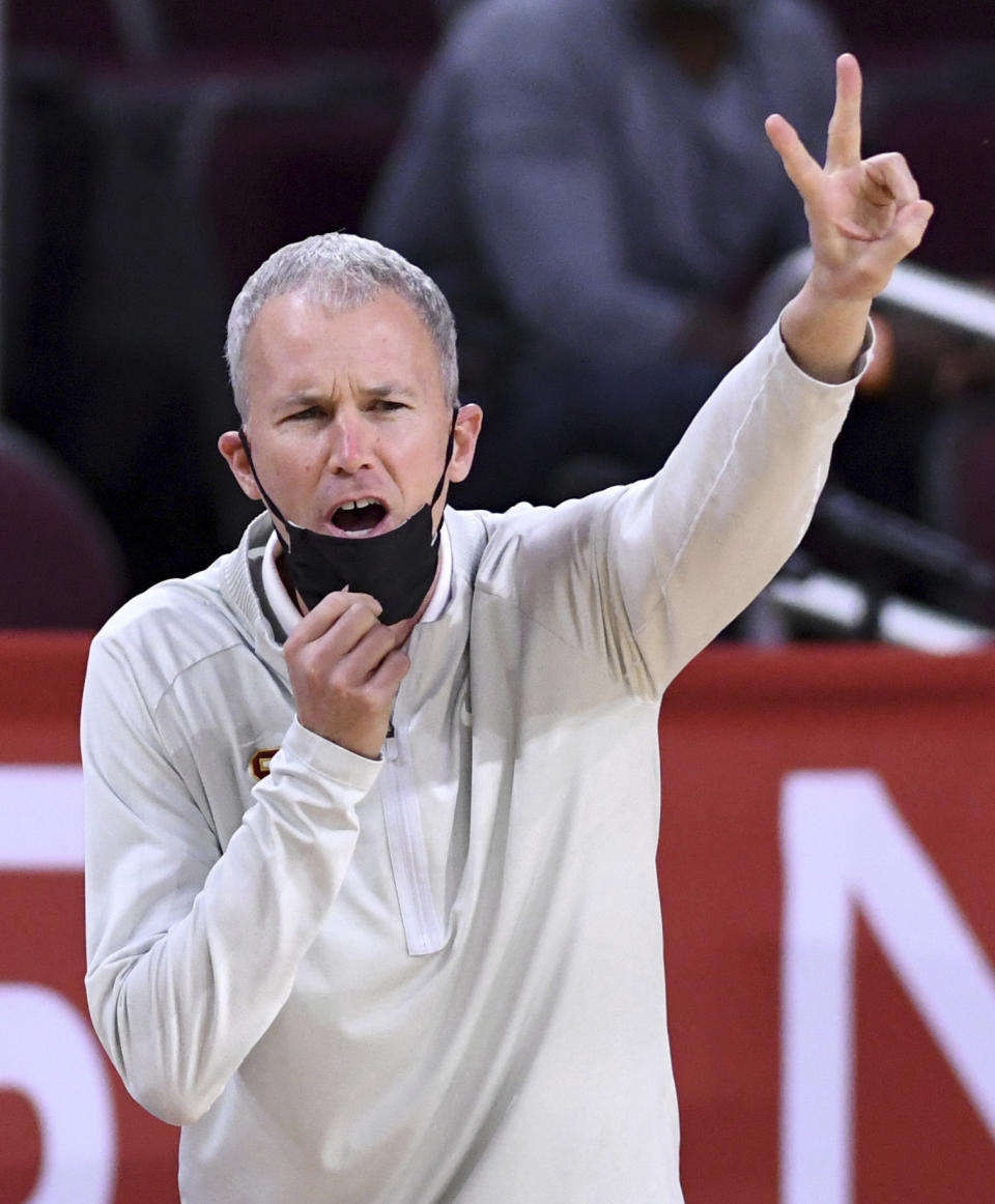 Southern California coach Andy Enfield signals to the team during the first half of an NCAA college basketball game against Washington State in Los Angeles on Saturday, Jan. 16, 2021. (Keith Birmingham/The Orange County Register via AP)