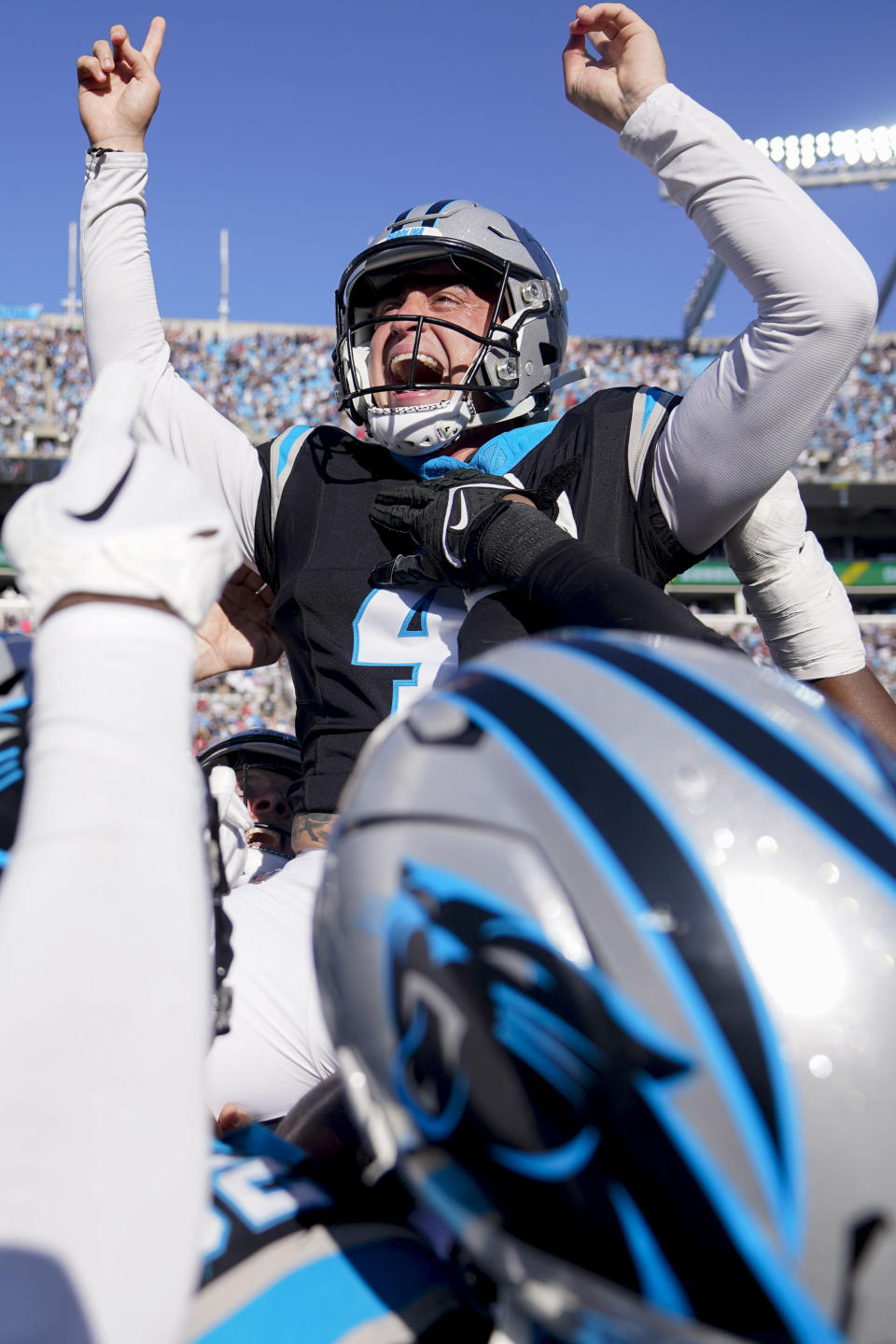 Carolina Panthers' Eddy Pineiro (4) celebrates after kicking the game-winning field goal after an an NFL football game against the Houston Texans, Sunday, Oct. 29, 2023, in Charlotte, N.C. The Carolina Panthers won 15-13.(AP Photo/Erik Verduzco)