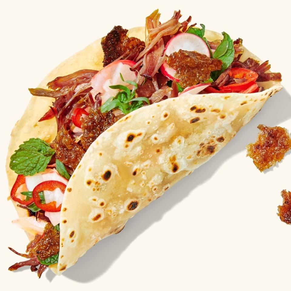 A duck carnitas taco. 