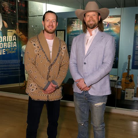 John Shearer/Getty Images Tyler Hubbard and Brian Kelley in Nashville in February 2022