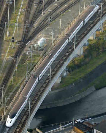 Derailed Shinkansen bullet train caused by an earthquake is seen in Kumamoto, southern Japan, in this photo taken by Kyodo April 15, 2016. Mandatory credit REUTERS/Kyodo