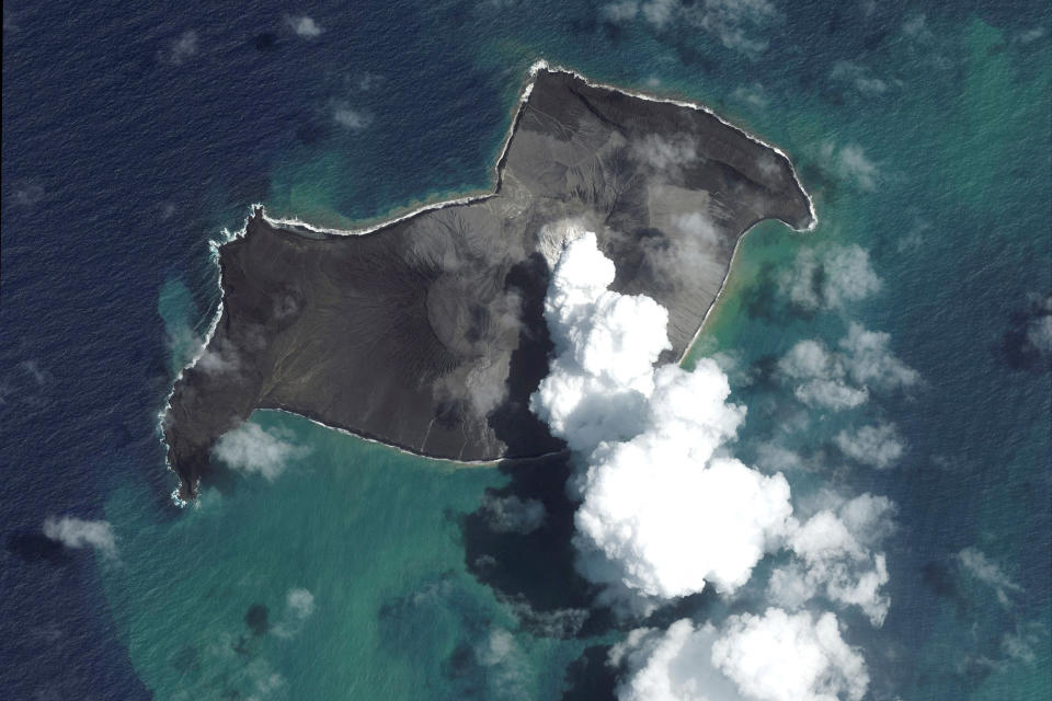 Image: A satellite image shows the Hunga Tonga-Hunga Ha'apai volcano before its main eruption (MAXAR / via Reuters)