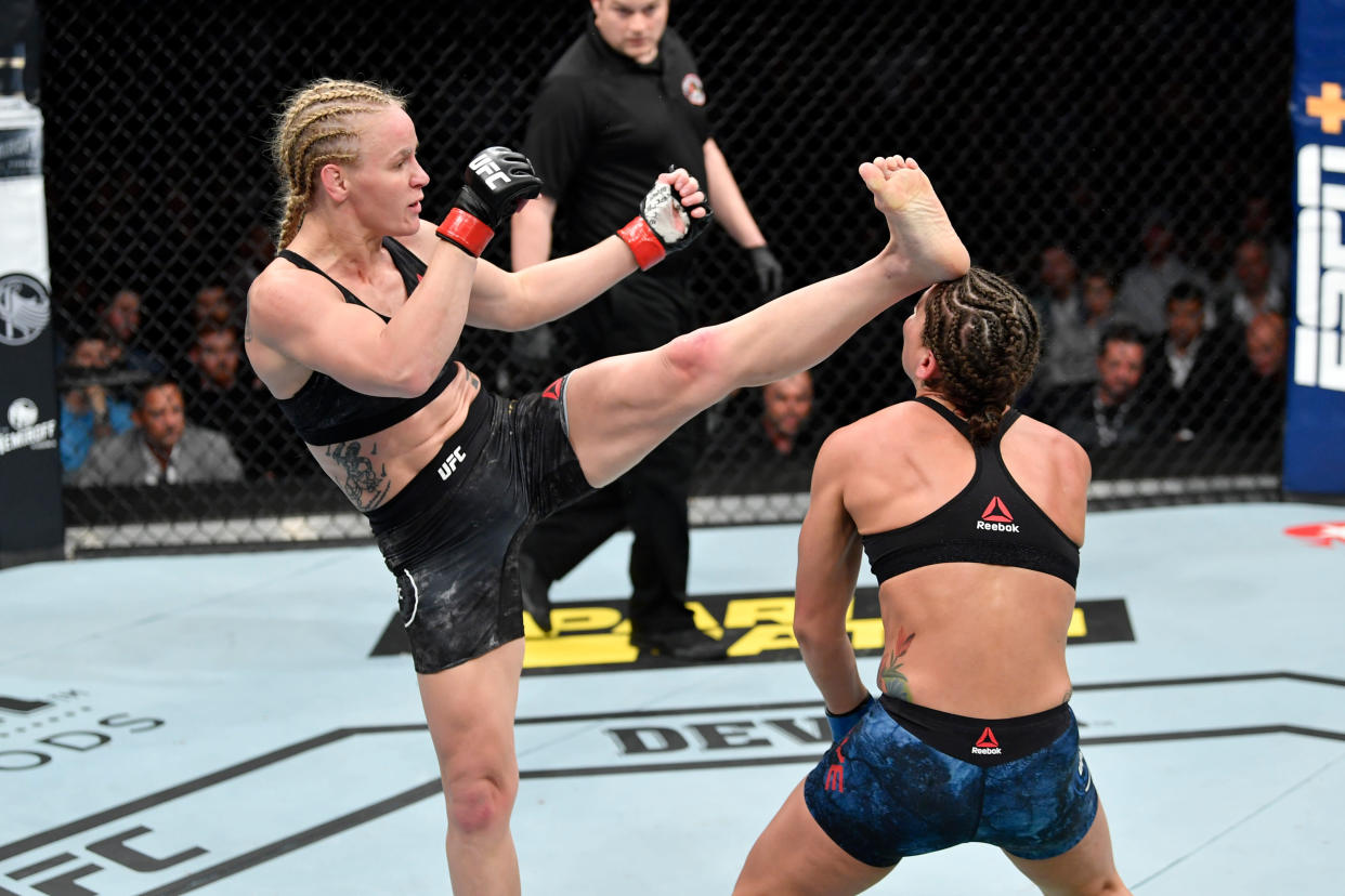 CHICAGO, IL - JUNE 08:  (L-R) Valentina Shevchenko of Kyrgyzstan knocks out Jessica Eye in their women's flyweight championship bout during the UFC 238 event at the United Center on June 8, 2019 in Chicago, Illinois. (Photo by Jeff Bottari/Zuffa LLC/Zuffa LLC via Getty Images)