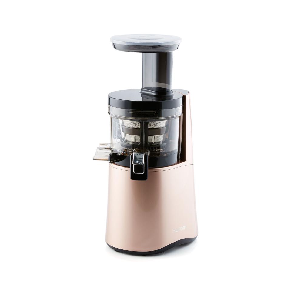 Hurom H-AA Slow Juicer in rose gold; $459. crateandbarrel.comx