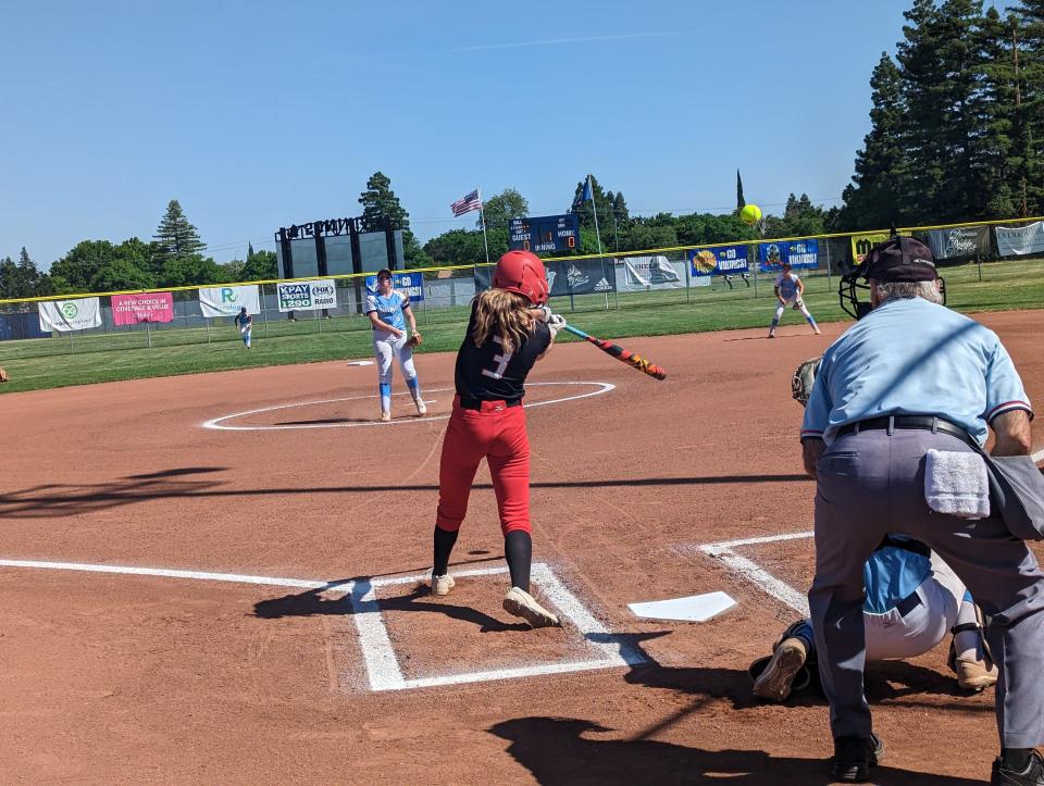 In this file photo, Foothill junior Morgan Kingsbury (left) fouls a pitch off against Pleasant Valley junior Ella Thurman (back) during the CIF Northern Section Division III title game on Thursday, May 18, 2023.