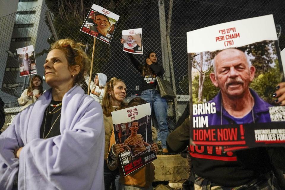 Israeli protesters in Tel Aviv call for the release of the hostages held in the Gaza Strip by Hamas on Nov. 28, 2023. <a href="https://newsroom.ap.org/detail/IsraelPalestinians/ef40ba52e7064a04b7fc9b089502fb9e/photo?Query=2023%20hostage&mediaType=photo&sortBy=&dateRange=Anytime&totalCount=1083&currentItemNo=11" rel="nofollow noopener" target="_blank" data-ylk="slk:AP Photo/Ariel Schalit;elm:context_link;itc:0;sec:content-canvas" class="link ">AP Photo/Ariel Schalit</a>