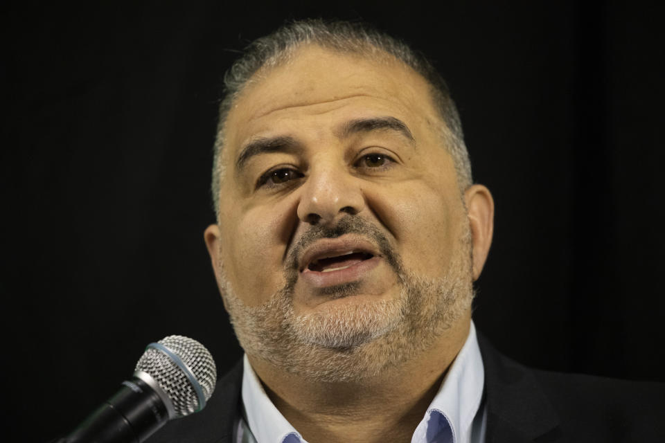 Mansour Abbas, leader of the United Arab List, also known by the Hebrew name Ra'am delivers a statement in Nazareth, Israel, Thursday, April 1, 2021. (AP Photo/Ariel Schalit)