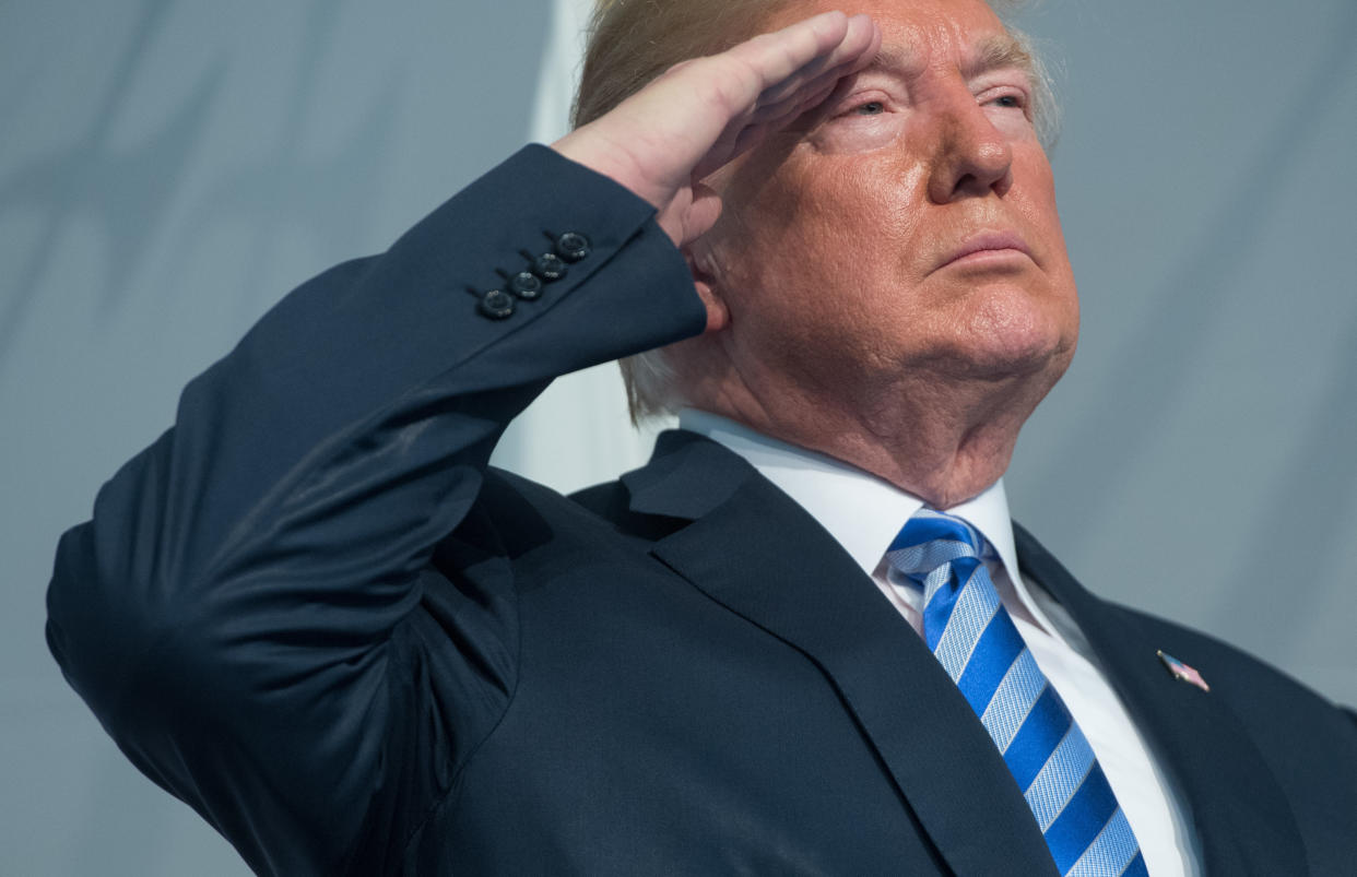 President Donald Trump salutes during a change of command ceremony in Washington, D.C., on June 1. His lawyers have seemingly argued that, as president, he is above investigation by the&nbsp;Department of Justice. (Photo: SAUL LOEB via Getty Images)
