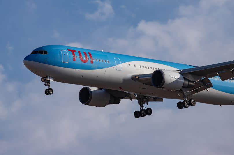 A photo of a TUI plane