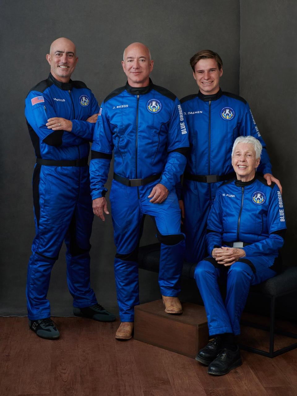 Amazon founder Jeff Bezos (centre) and the Blue Origin crew before their flight into space earlier this year