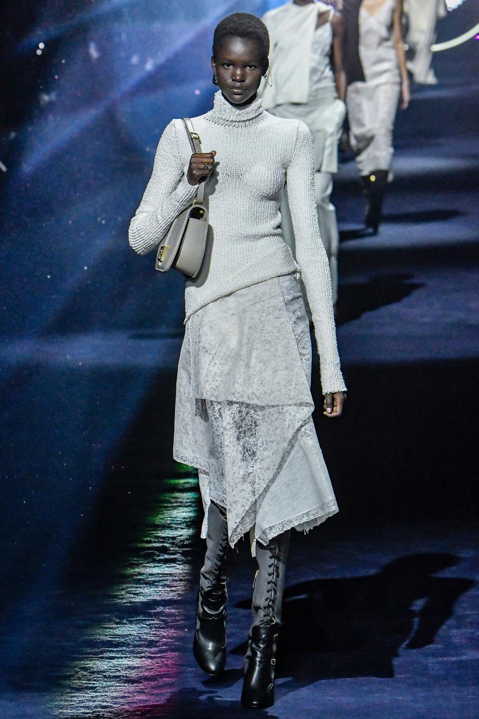 A model walks the Fendi runway during Milan Fashion Week.
