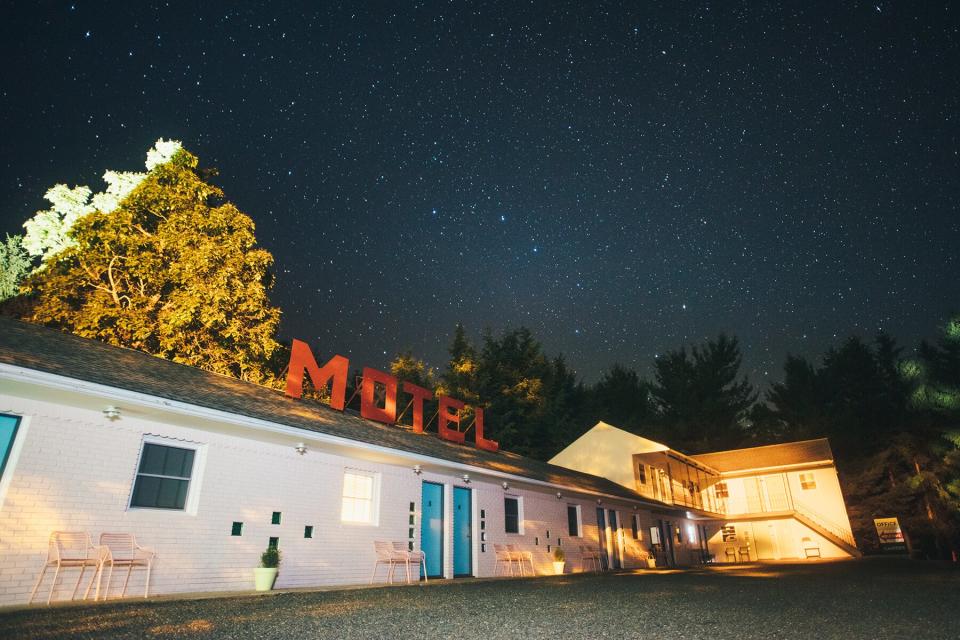 Exterior of Starlite Motel at nighttime