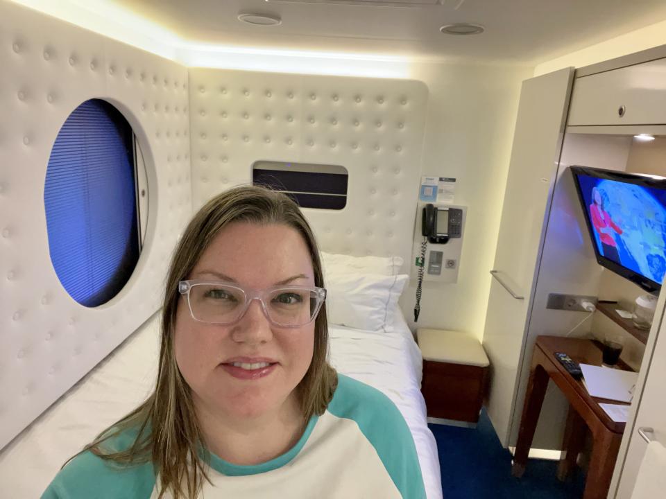 Lauren Mack seflie in her single-occupancy studio aboard Norwegian Getaway