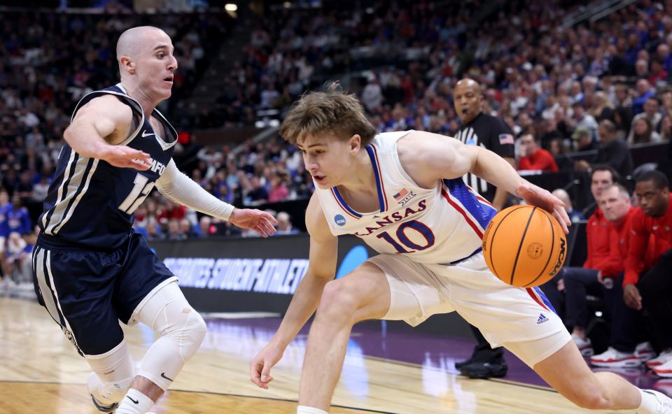 Kansas basketball guard Johnny Furphy (10) looks to make a play during a NCAA tournament game against Samford on March 21, 2024 in Salt Lake City.