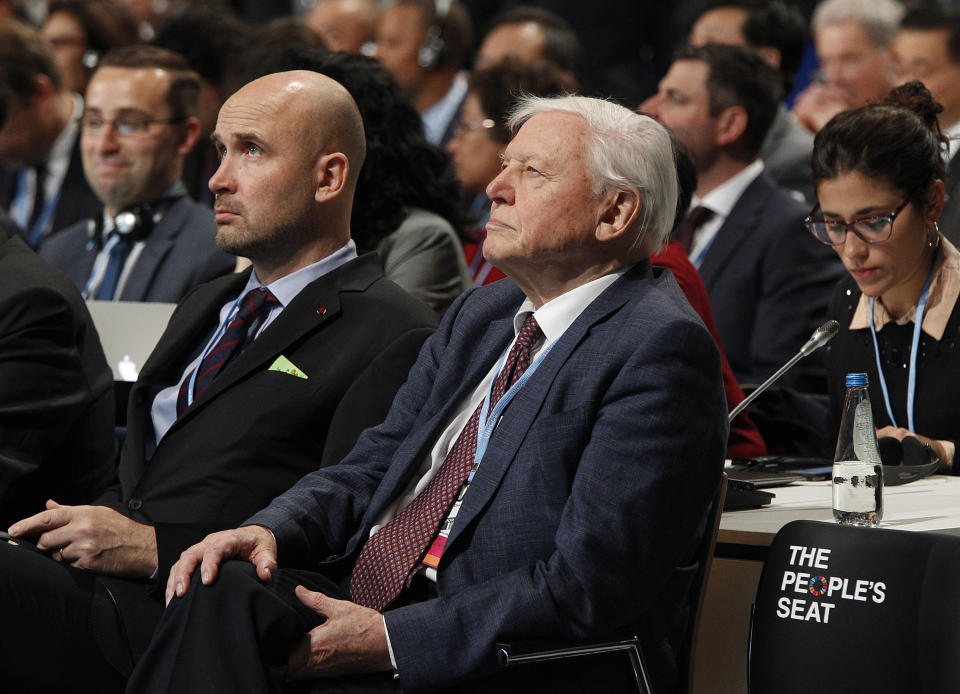 Natural historian Sir David Attenborough, second right, listens to speeches during the opening of COP24 UN Climate Change Conference 2018 in Katowice, Poland, Monday, Dec. 3, 2018. (AP Photo/Czarek Sokolowski)