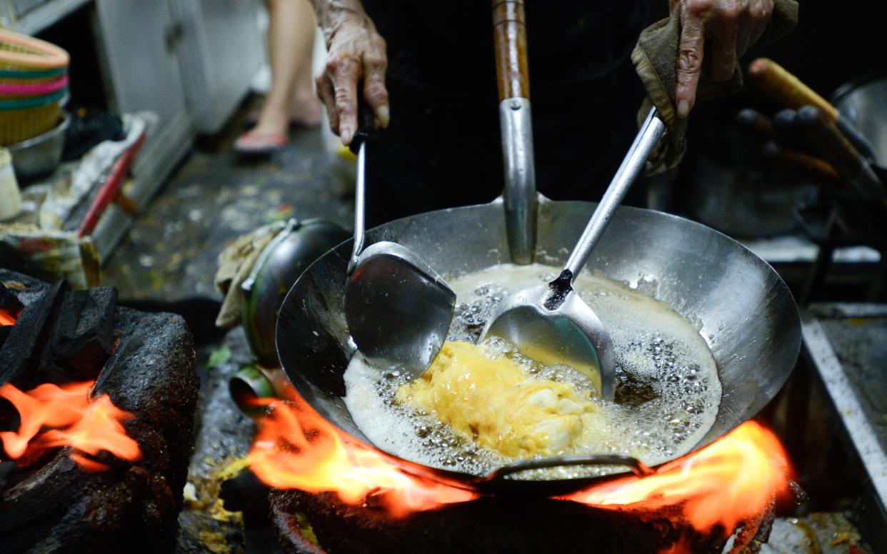 Jay Fai is famed for its crisp seafood-stuffed 1000 Thai baht (£23) omelettes - Anusak Laowilas/NurPhoto