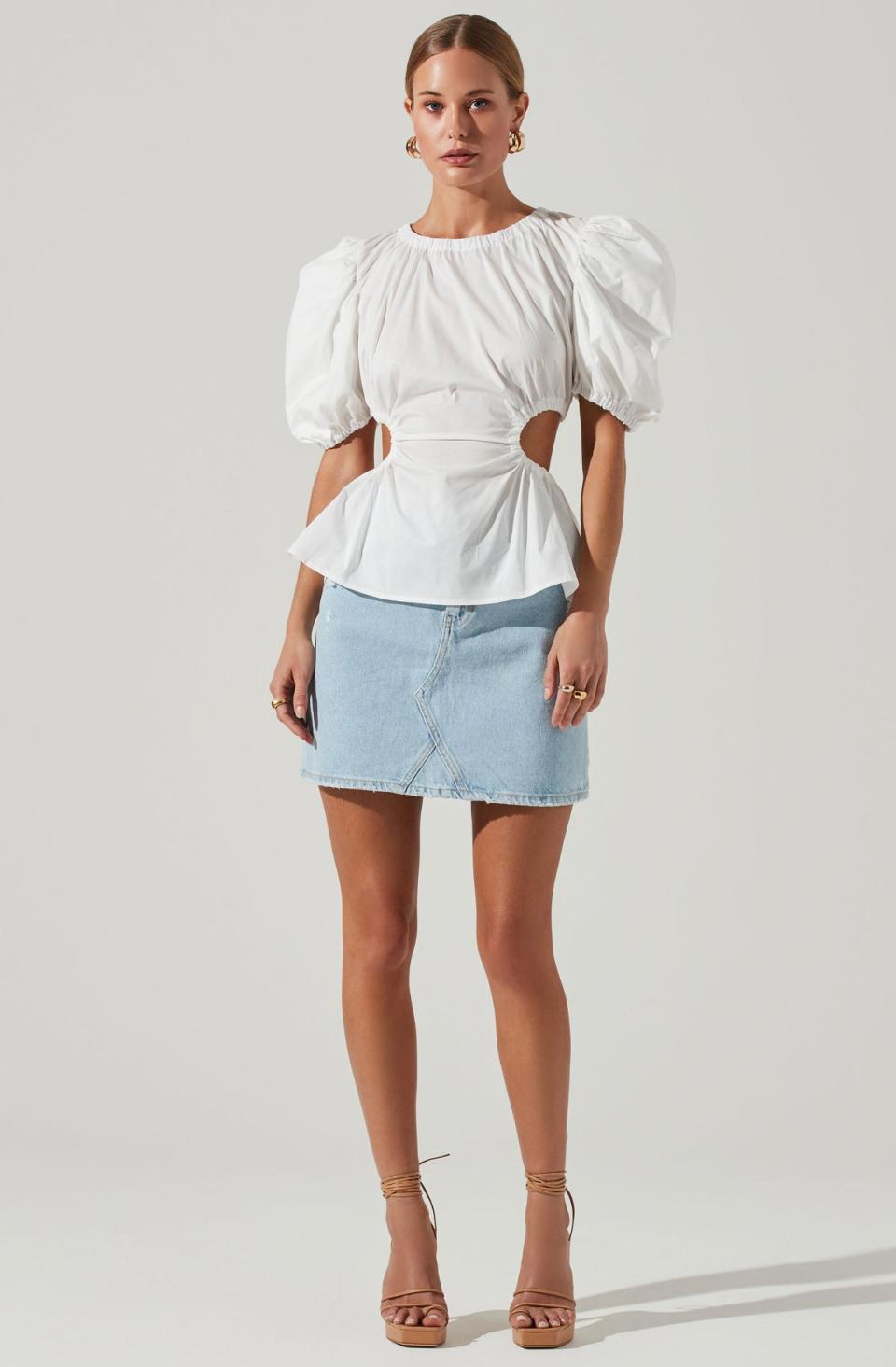 <p><a href="https://www.astrthelabel.com/collections/shop-all/products/juno-side-cutout-puff-sleeve-peplum-top?apid=42010335871152&color=White" rel="nofollow noopener" target="_blank" data-ylk="slk:Shop Now;elm:context_link;itc:0;sec:content-canvas" class="link ">Shop Now</a></p><p>ASTR The Label Juno Side Cutout Puff Sleeve Peplum Top</p><p>$78.00</p><p>astrthelabel.com</p>