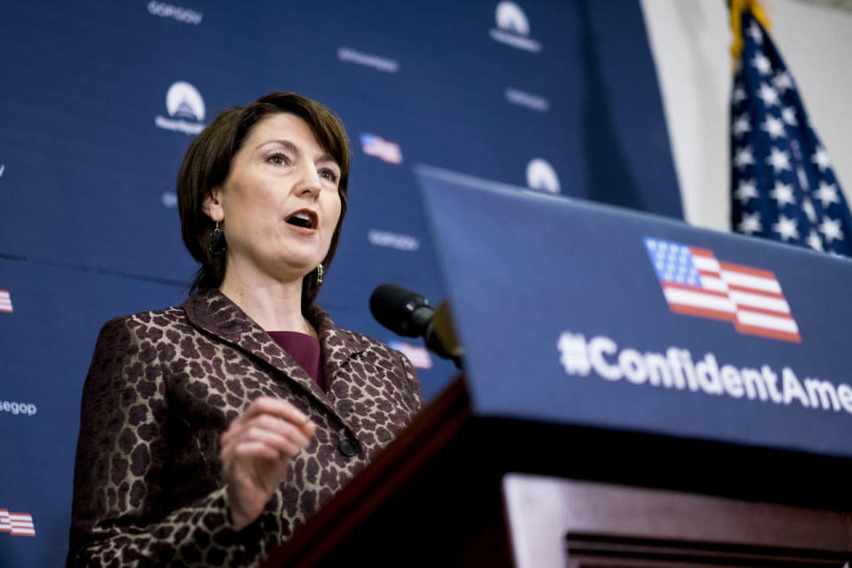 Rep. Cathy McMorris Rodgers, R-Wash., speaks to reporters following the weekly House GOP conference meeting at the U.S. Capitol on January 12, 2016, in Washington, D.C. She wore the same outfit — an animal print blazer over a maroon dress — to the State of the Union later that night. 