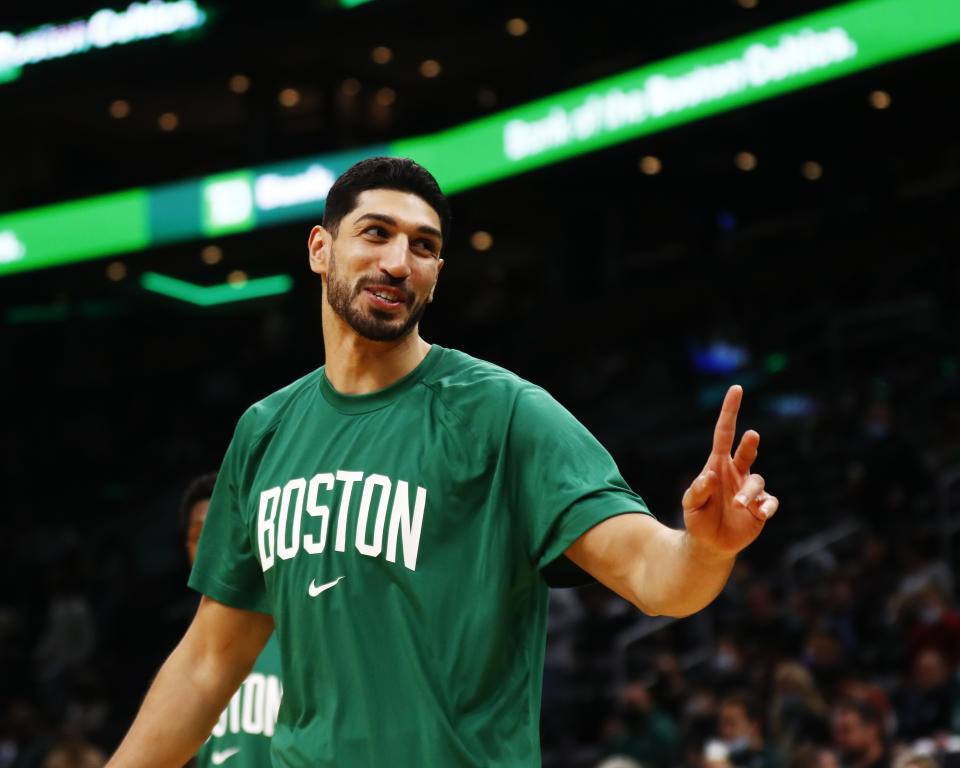 BOSTON, MASSACHUSETTS - OCTOBER 27: Enes Kanter #13 of the Boston Celtics reacts before the game against the Washington Wizards at TD Garden on October 27, 2021 in Boston, Massachusetts. NOTE TO USER: User expressly acknowledges and agrees that, by downloading and or using this photograph, User is consenting to the terms and conditions of the Getty Images License Agreement. (Photo by Omar Rawlings/Getty Images)