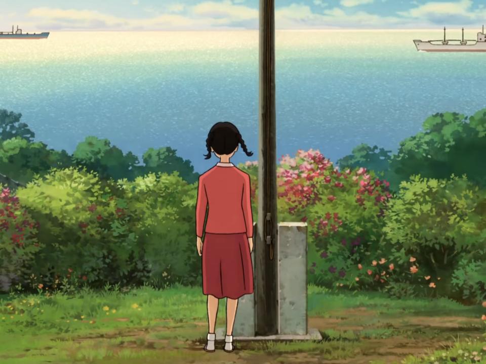 Umi Matsuzaki standing at an overlook in from up on poppy hill