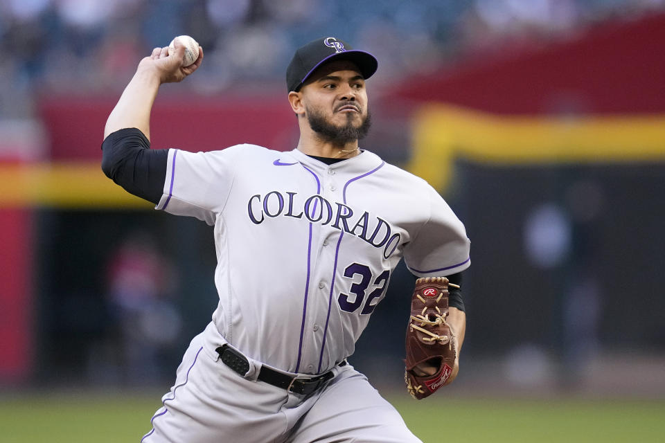 Colorado Rockies staring pitcher Dinelson Lamet throws to an Arizona Diamondbacks batter during the first inning of a baseball game Wednesday, May 31, 2023, in Phoenix. (AP Photo/Ross D. Franklin)