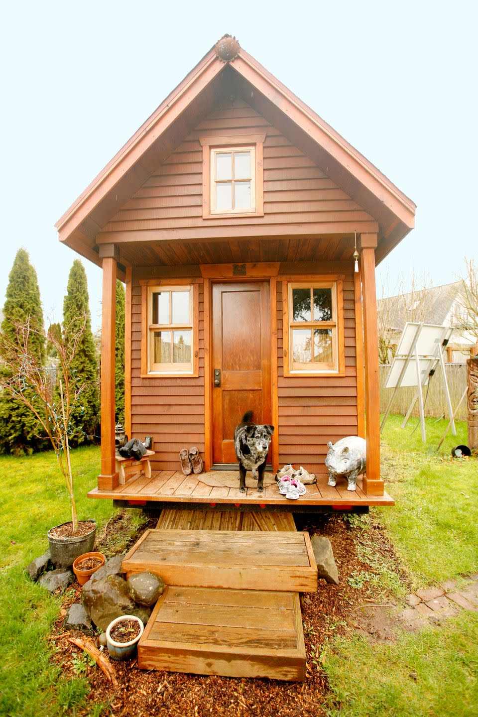 <p>This is the Olympia, Washington home of tiny house pioneer Dee Williams, author of <em><a href="https://www.amazon.com/The-Big-Tiny-Built-It-Myself-Memoir/dp/0399166173?tag=syn-yahoo-20&ascsubtag=%5Bartid%7C10050.g.1887%5Bsrc%7Cyahoo-us" rel="nofollow noopener" target="_blank" data-ylk="slk:The Big Tiny;elm:context_link;itc:0;sec:content-canvas" class="link ">The Big Tiny</a>, </em>a memoir that details her decision to downsize to an 84-square-foot house that she built from the ground up after a near-death experience. Constructed atop a metal truck trailer, the super-small pine-and-cedar bungalow houses a kitchen counter with a propane one-burner, a sleeping loft, solar-powered lights, a composting toilet, and a sink (but no running water). To help others realize their tiny house dreams, Dee also founded <a href="http://padtinyhouses.com/" rel="nofollow noopener" target="_blank" data-ylk="slk:Portland Alternative Dwellings;elm:context_link;itc:0;sec:content-canvas" class="link ">Portland Alternative Dwellings</a>, a tiny house education, resource, and consulting company.<br></p><p><a class="link " href="https://www.amazon.com/The-Big-Tiny-Built-It-Myself-Memoir/dp/0399166173?tag=syn-yahoo-20&ascsubtag=%5Bartid%7C10050.g.1887%5Bsrc%7Cyahoo-us" rel="nofollow noopener" target="_blank" data-ylk="slk:SHOP NOW;elm:context_link;itc:0;sec:content-canvas">SHOP NOW</a> <a class="link " href="http://www.nytimes.com/2014/04/17/garden/square-feet-84-possessions-305.html?_r=1" rel="nofollow noopener" target="_blank" data-ylk="slk:SEE INSIDE;elm:context_link;itc:0;sec:content-canvas">SEE INSIDE</a></p>