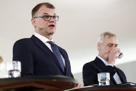 Centre Party Chairman Juha Sipila and Government Negotiator, Social Democratic Party Chairman Antti Rinne attend a news conference in Helsinki