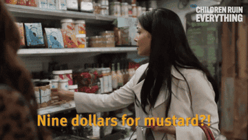 Nanzeen Contractor says, "Nine dollars for mustard?!" on Children Ruin Everything