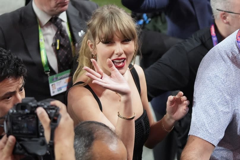 Taylor Swift moves on the field after the NFL Super Bowl 58 football game between the San Francisco 49ers and the Kansas City Chiefs, 11 February 2024.