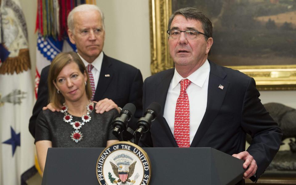 Mr Biden was criticised for touching Stephanie Carter, who is married to former Secretary of Defense Ashton Carter - SAUL LOEB/AFP/Getty Images