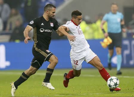 Football Soccer - Olympique Lyon v Sevilla - UEFA Champions League Group Stage - Group stage - Stade de Lyon - Decines, France - 7/12/16. Olympique Lyon's Jeremy Morel in action with Sevilla's Wissam Ben Yedder. REUTERS/Robert Pratta