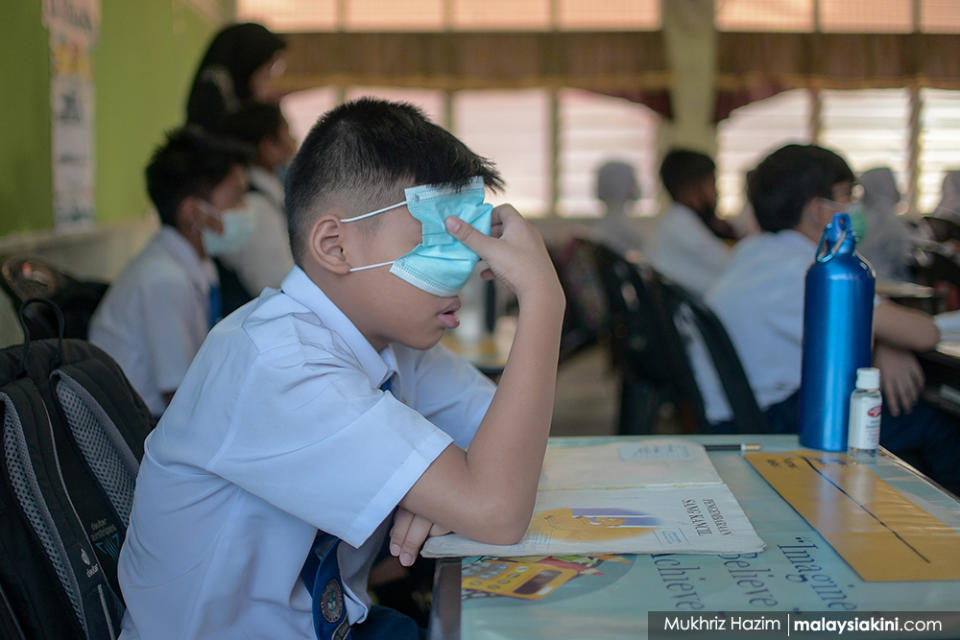 Year Five and Six primary school students from Sekolah Kebangsaan Seksyen 6 return to school as the MCO was relaxed on Jul 15, 2020, in Shah Alam, Selangor.