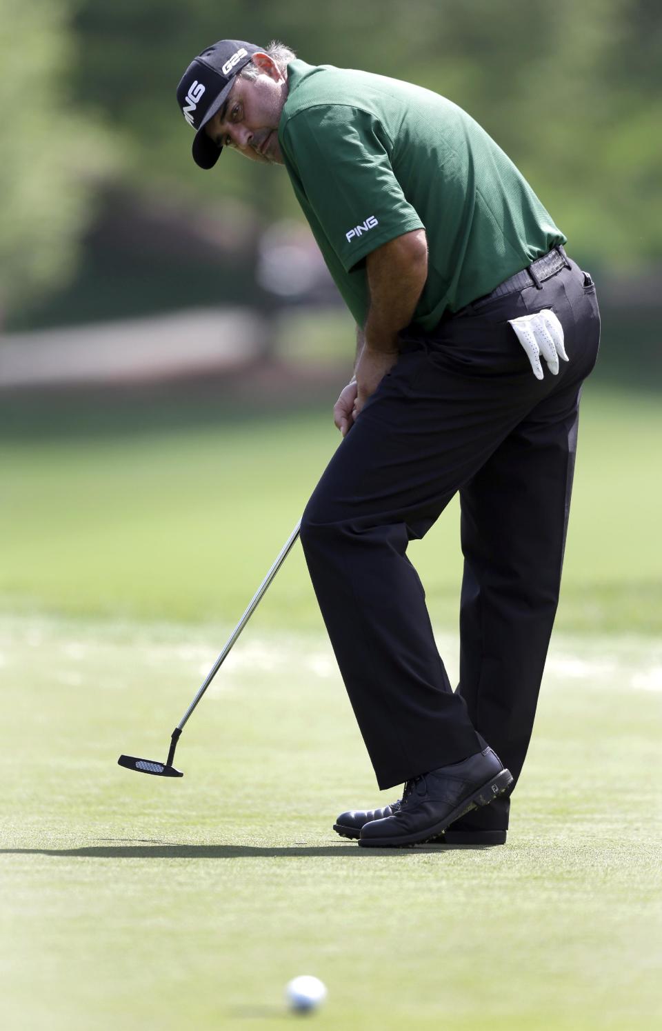 Angel Cabrera, of Argentina, reacts as he misses a putt on the 15th hole during the first round of the Wells Fargo Championship golf tournament in Charlotte, N.C., Thursday, May 1, 2014. (AP Photo/Bob Leverone)