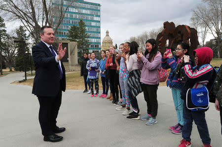 Jason Kenney, Alberta's premier-designate and leader of the United Conservative Party (UCP), meets with a grade 6 class in front of the Legislature Building in Edmonton, Alberta, Canada April 17, 2019. REUTERS/Candace Elliott