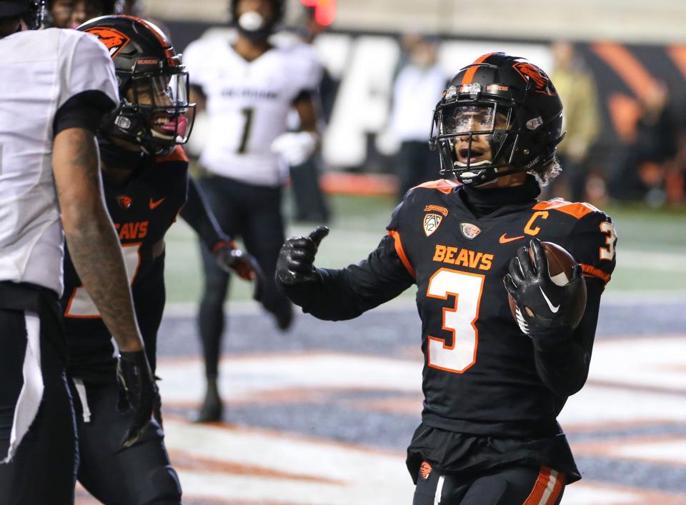 Oregon State defensive back Jaydon Grant (3) celebrates an interception in the end zone against Colorado at Reser Stadium in Corvallis, Ore. on Saturday, Oct. 22, 2022.
