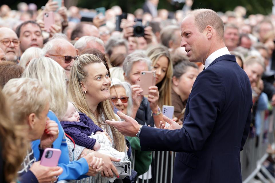 Prince William, Prince of Wales speaks to members of the public at Sandringham on September 15, 2022 in King's Lynn, England. The Prince and Princess of Wales are visiting Sandringham to view tributes to Queen Elizabeth II, who died at Balmoral Castle on September 8, 2022.