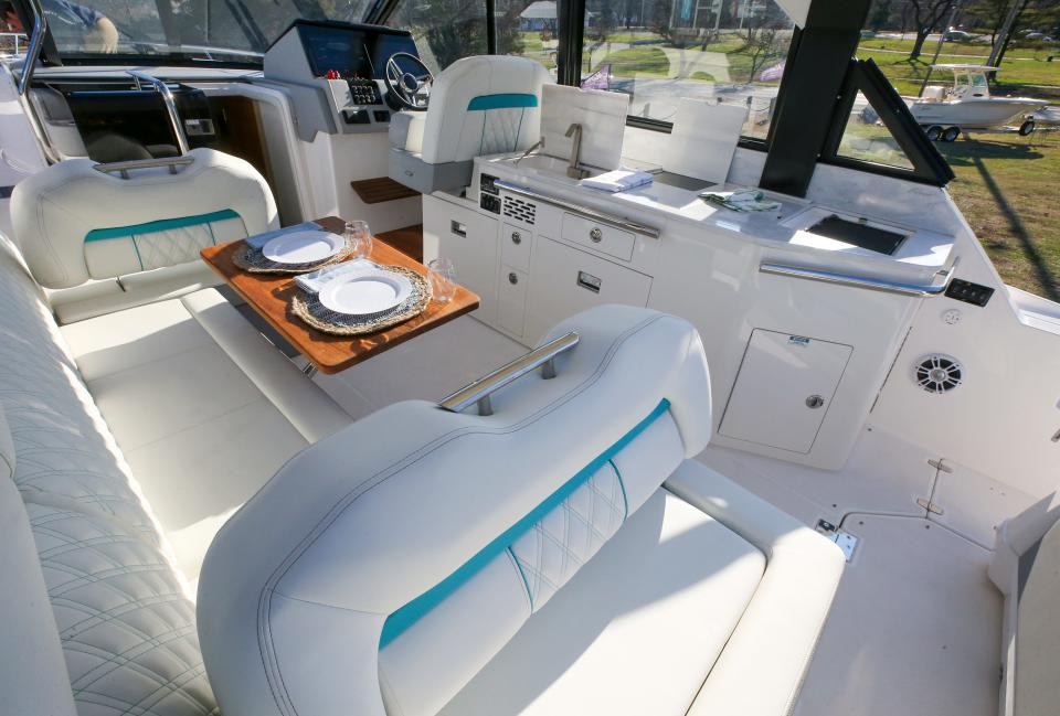 Open air salon and galley in the Regal 36 Grande Coupe at Marine Sales & Service