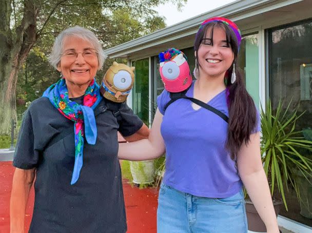 PHOTO: Danielle Boyer poses with her grandmother, both wearing her invention the SkoBot on their shoulders. (Danielle Boyer)