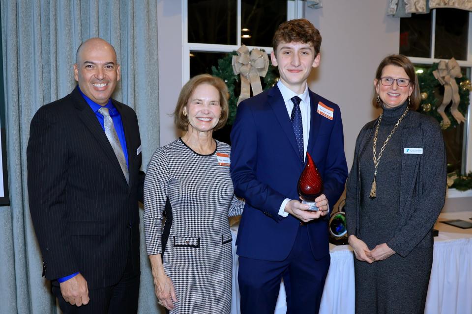 Harrison Neff was presented with the Youth of the Year Award. From left to right are Rob Glew, Sally Stebbins, Harrison Neff and Michele Sheppard.