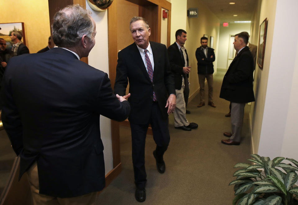 Ohio Gov. John Kasich, a potential 2020 Presidential candidate, shakes hands with a supporter in Concord, N.H., Thursday, Nov. 15, 2018. The visit marked Gov. Kasich's second trip to the state this year. (AP Photo/Charles Krupa)